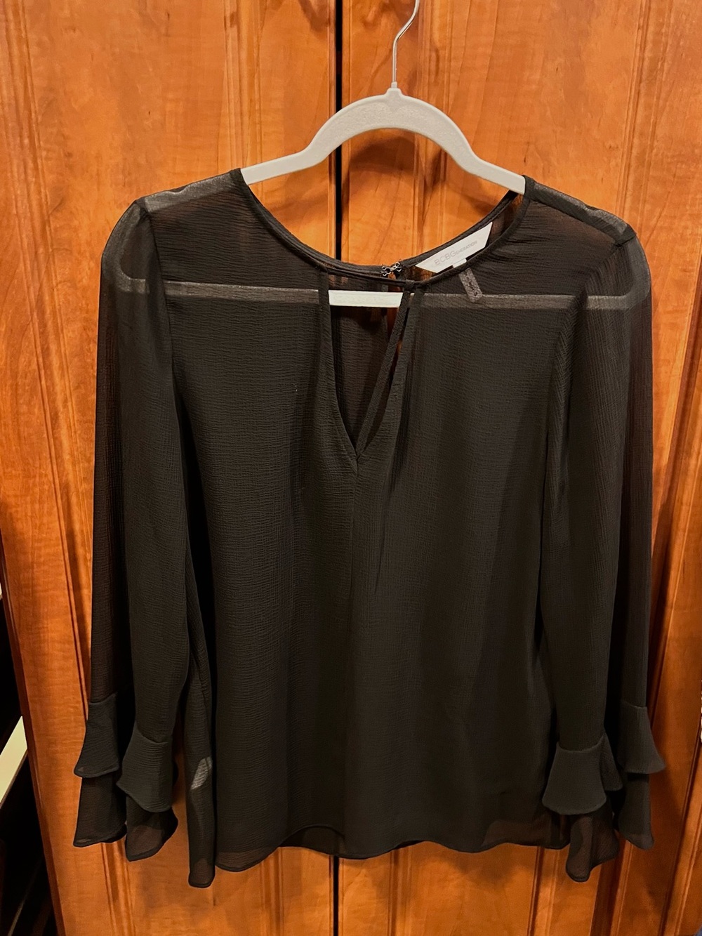BCBGeneration Black Sheer Long Sleeve Ruffle Cuff Top
